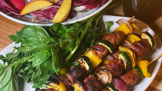 Beef polpette skewers over the fire with a nectarine and radicchio salad